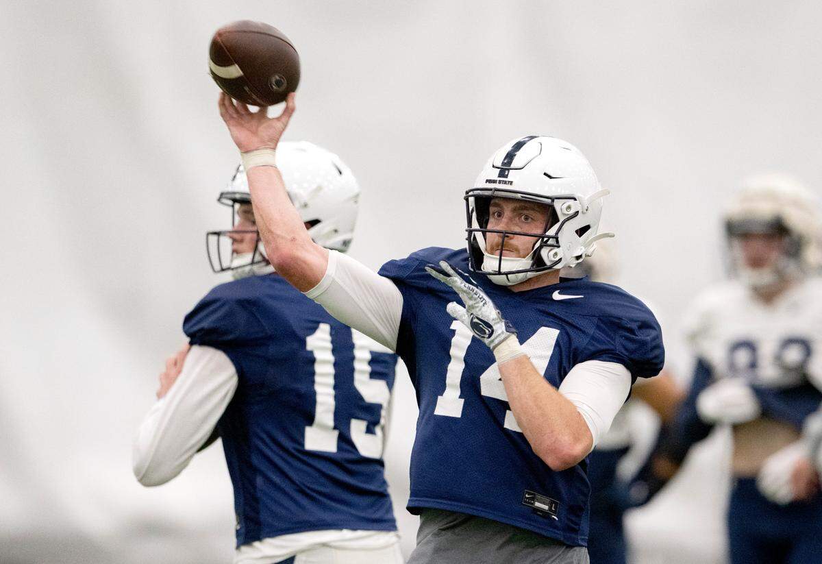 Penn State quarterback Sean Clifford makes a pass during practice on Wednesday, Oct. 26, 2022.