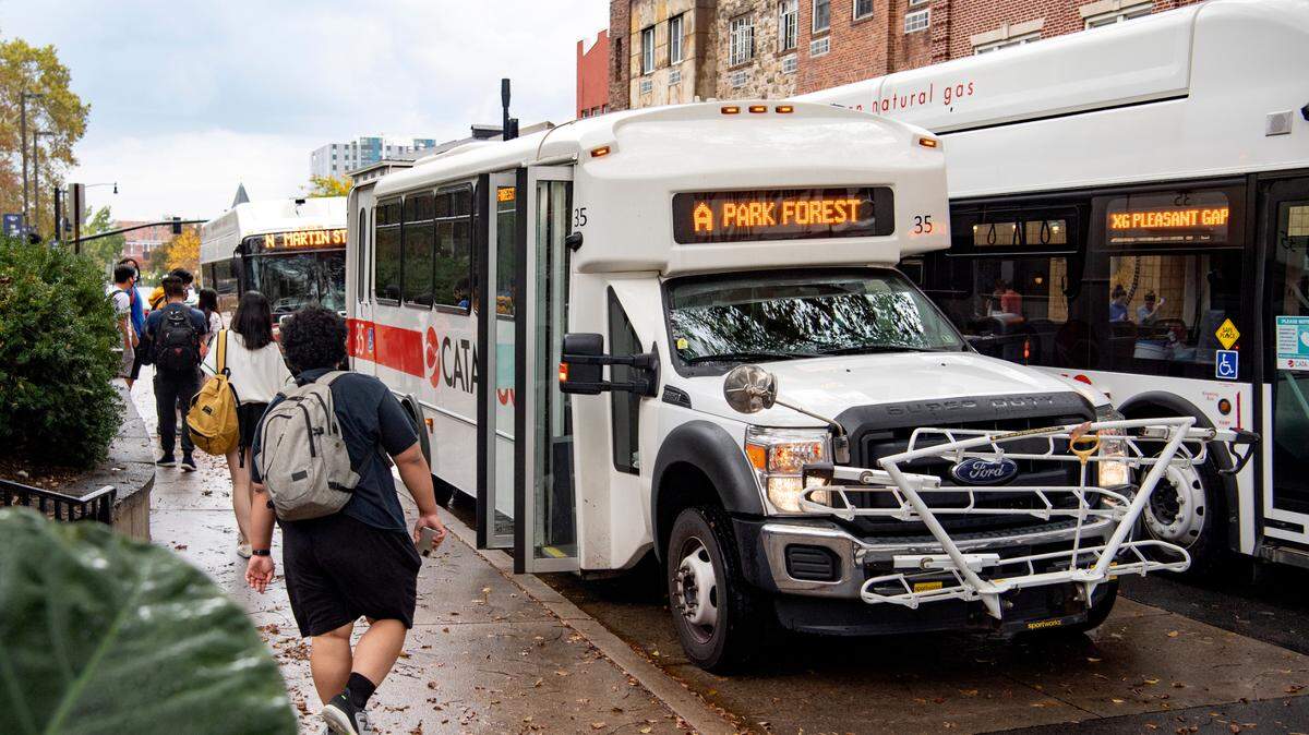 The CATA bus for the A route, Park Forest, waits for passengers at the Allen Street gates stop on Oct. 15. The route will be temporarily suspended starting Monday due to CATA’s staffing shortages.