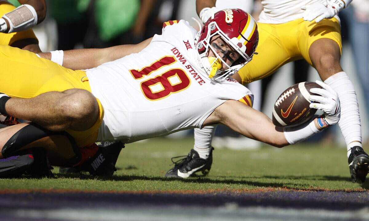 FORT WORTH, TEXAS - NOVEMBER 8: Benjamin Brahmer #18 of the Iowa State Cyclones reaches across the goal line to score a touchdown against the TCU Horned Frogs during the first half at Amon G. Carter Stadium on November 8, 2025 in Fort Worth, Texas.  (Photo by Ron Jenkins/Getty Images)
