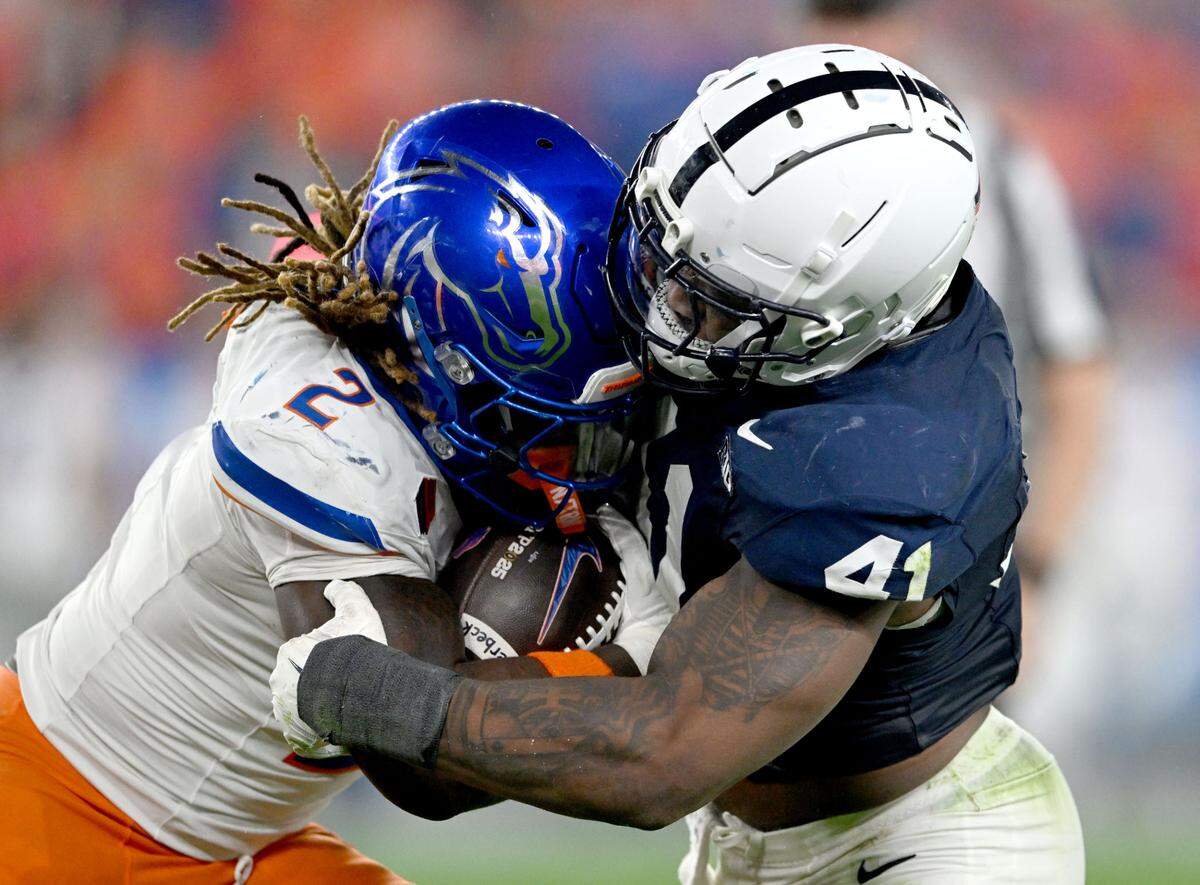 Penn State linebacker Kobe King stops Boise State running back Ashton Jeanty during the Fiesta Bowl on Tuesday, Dec. 31, 2024 at State Farm Stadium.