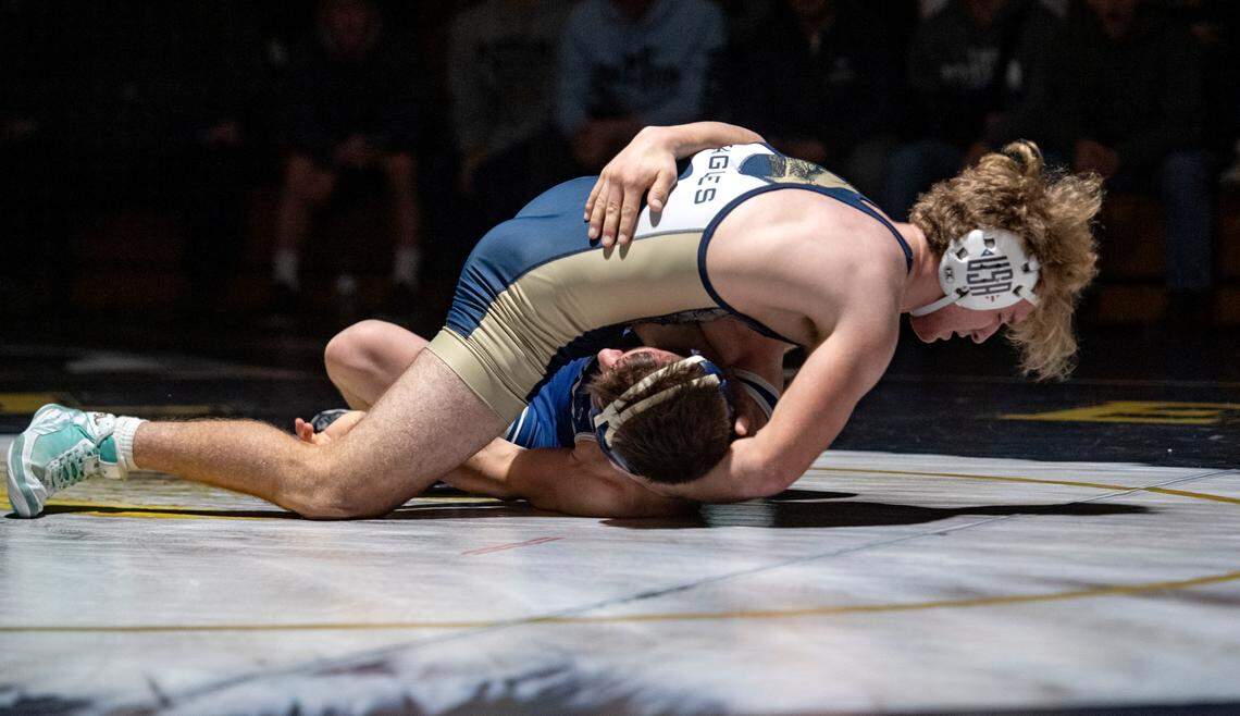 Bald Eagle Area’s Cameron Dubbs rolls Penns Valley’s Micah Fetterolf in the 160 lb bout of the District 6 2A team quarterfinals on Tuesday, Feb. 1, 2022. Dubbs won by fall at 2:49.