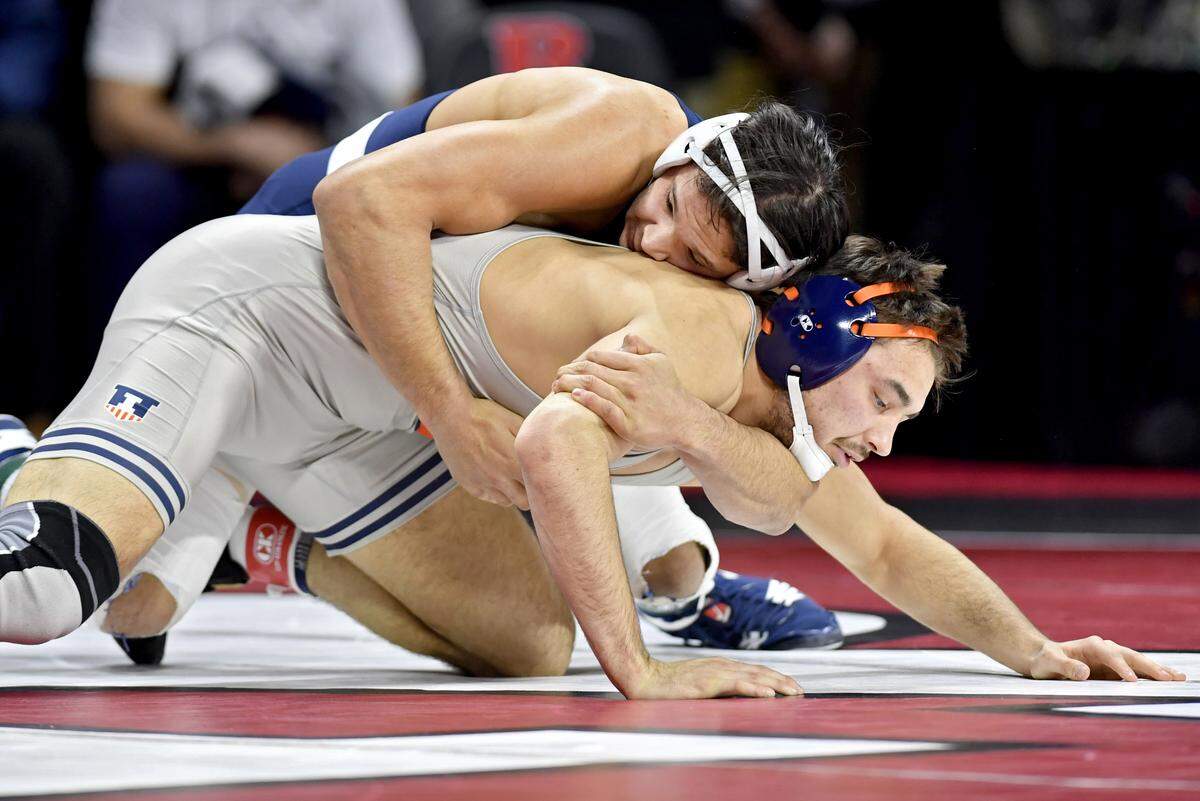 Penn State’s Shakur Rasheed controls Illinois’ Matt Wroblewski in the first round of the Big Ten Wrestling championships at Rutgers on Saturday, March, 7, 2020. Rasheed won by fall.