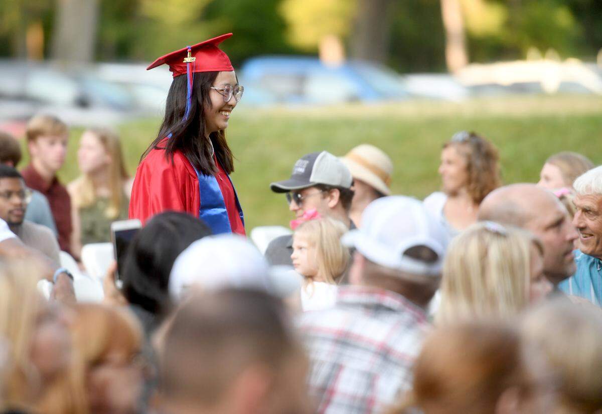 Fuliang Pan walks in to “Pomp & Circumstance” for the Grace Prep graduation on Friday, June 2, 2023 at Camp Kanesatake.