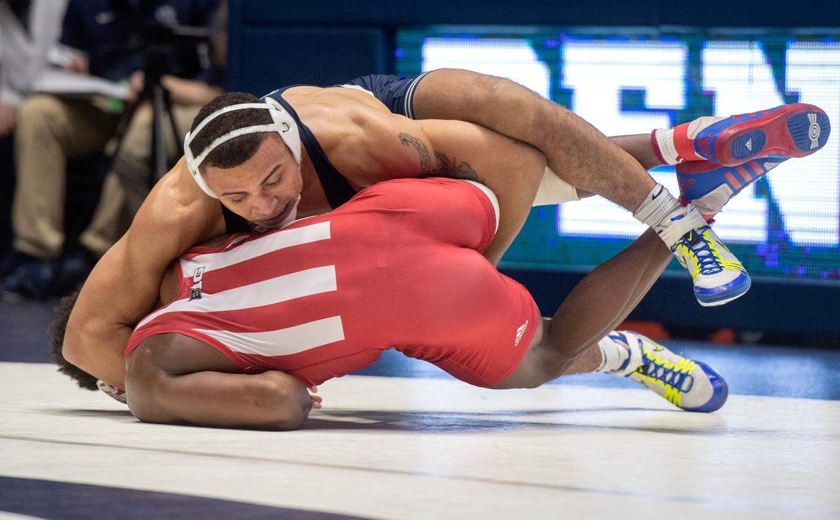 Penn State’s Aaron Brooks rolls Indiana’s Donnell Washington in the 184 lb bout during the match on Sunday, Jan. 9, 2022.