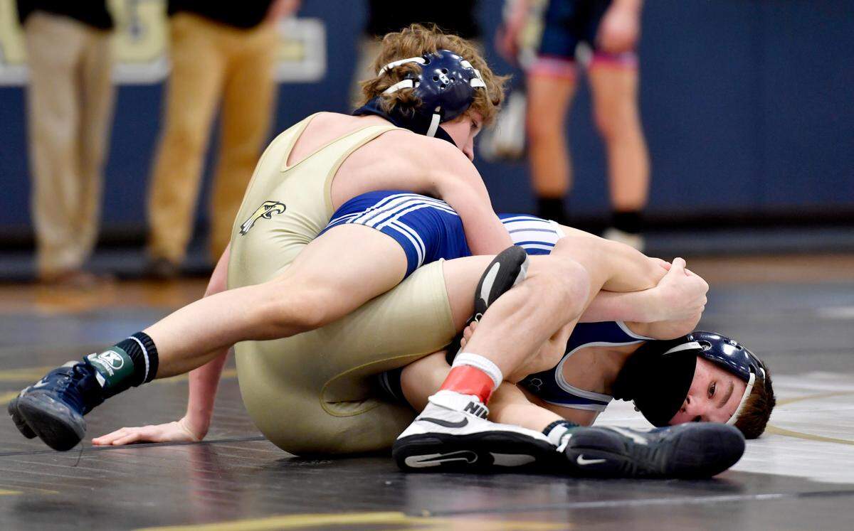 Bald Eagle Area’s Cooper Gilham controls Penns Valley’s Justin Darlington in a 126 lb bout during the District 6 AA section 2 tournament on Wednesday, Feb. 17, 2021.