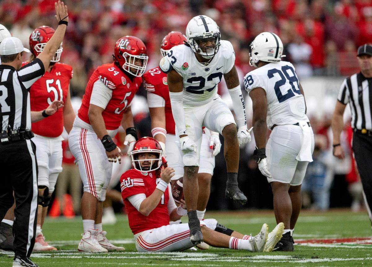 Penn State linebacker Curtis Jacobs celebrates stopping Utah quarterback Cam Rising in the second quarter of the Rose Bowl game on Monday, Jan. 2, 2023.