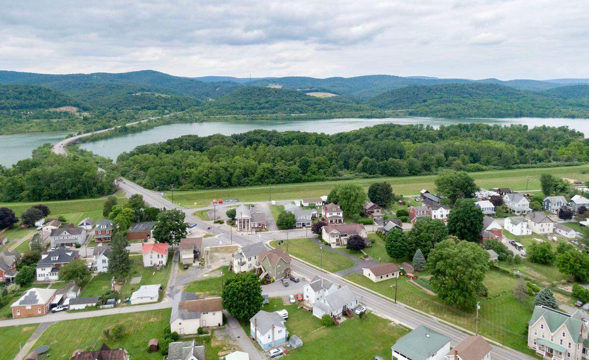 A aerial view over part of Howard Borough looking towards Bald Eagle State Park from the Howard Community Park on Tuesday, June 11, 2024.