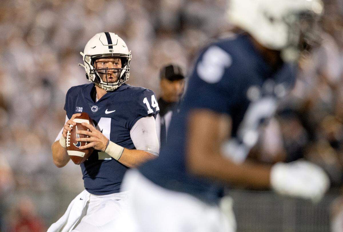 Penn State quarterback Sean Clifford drops back to make a pass.
