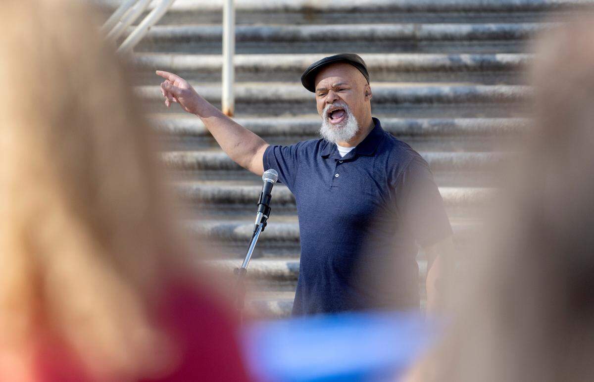 Errol Henderson speaks during the “We Believe in Anti-Racism and Racial Justice at Penn State” rally hosted by a committee of concerned Penn State faculty outside of Old Main on Thursday, Nov. 3, 2022.
