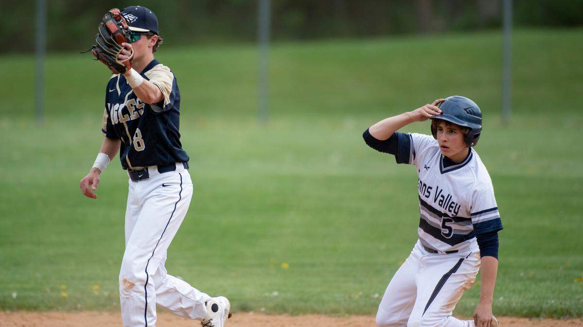Penns Valley’s Hayden Houser reacts after sliding into 2nd base as Bald Eagle’s Kahale Burns holds the ball during a high school baseball game between Penns Valley and Bald Eagle Area High School on, Tuesday, May 4, 2021 in Spring Mills, Pa.