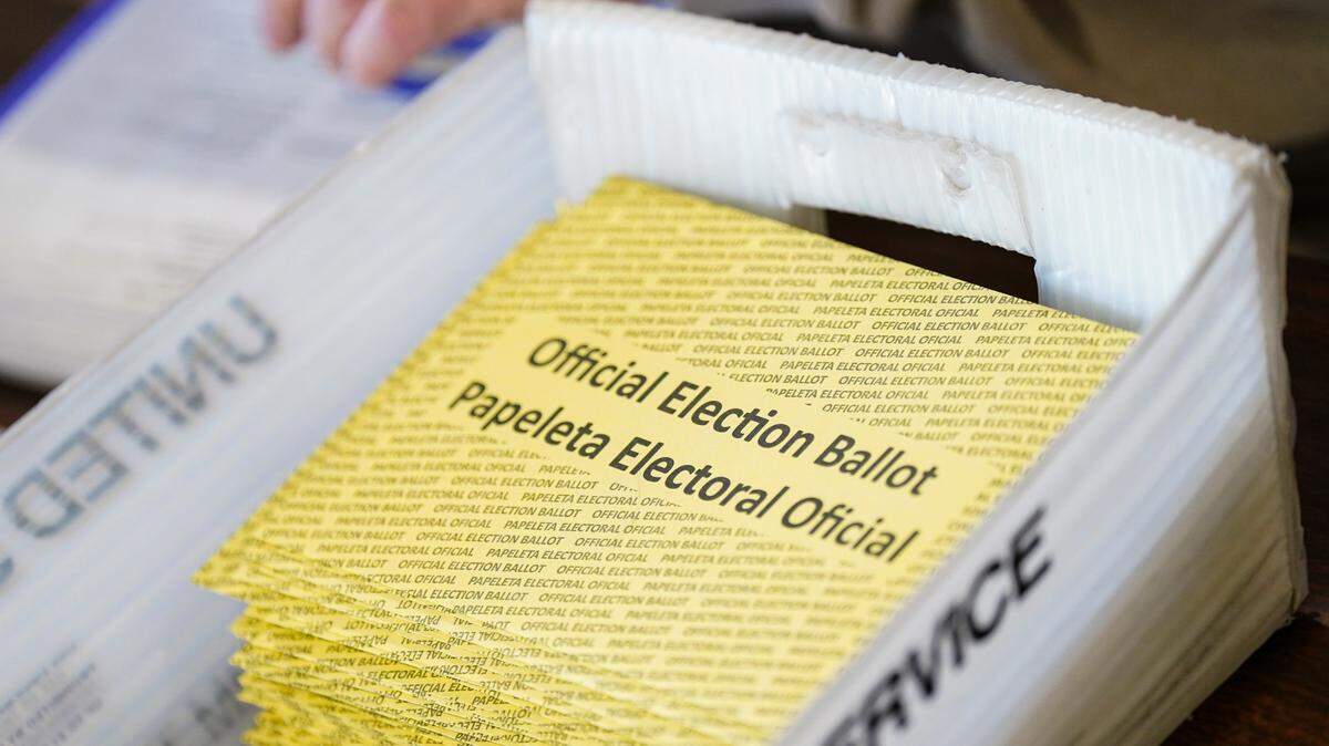 Workers sort mail ballots on Nov. 5, 2024, at Northampton County Courthouse in Easton, Pennsylvania.