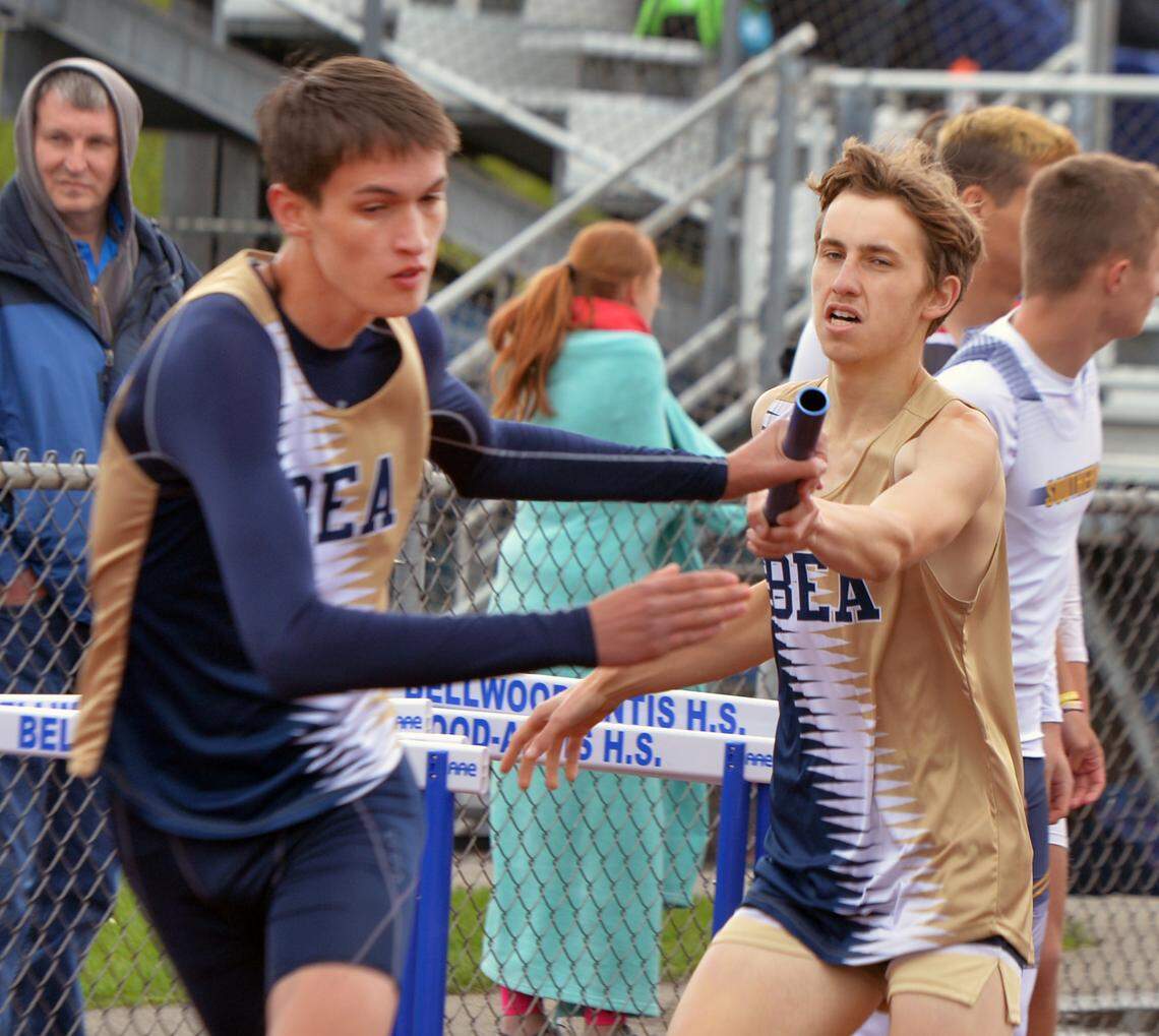 Bald Eagle Area’s Colton Wagner, right, hands off to Isaac Dechow in the 3200 relay at Bellwood High School Monday during the Bellwood Invitational track meet on Monday, May 1, 2023.