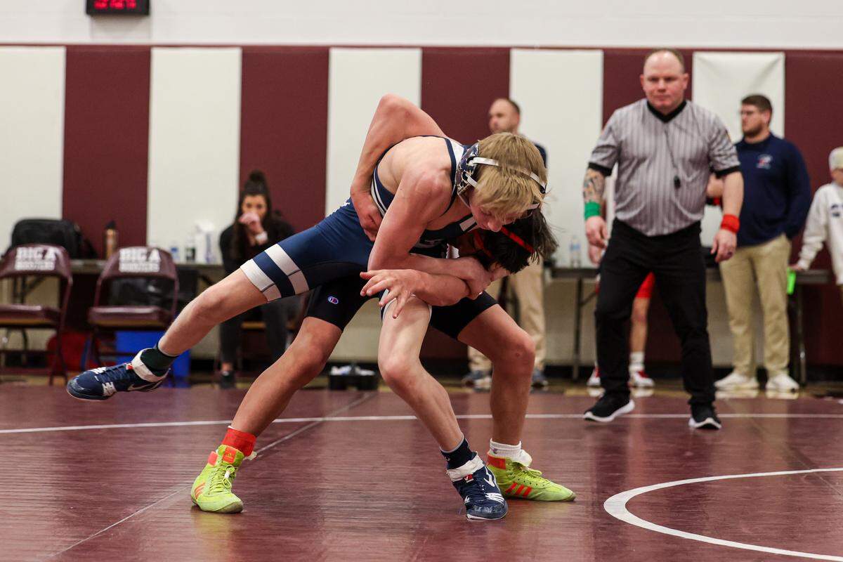 Philipsburg-Osceola’s Hayden Koptchak battles with Central’s Ty Matthews in their 107-pound semifinals match of the District 6 Class 2A Championships on Saturday, Feb. 14, 2026, in Altoona. Matthews pinned Koptchak in 4:56.