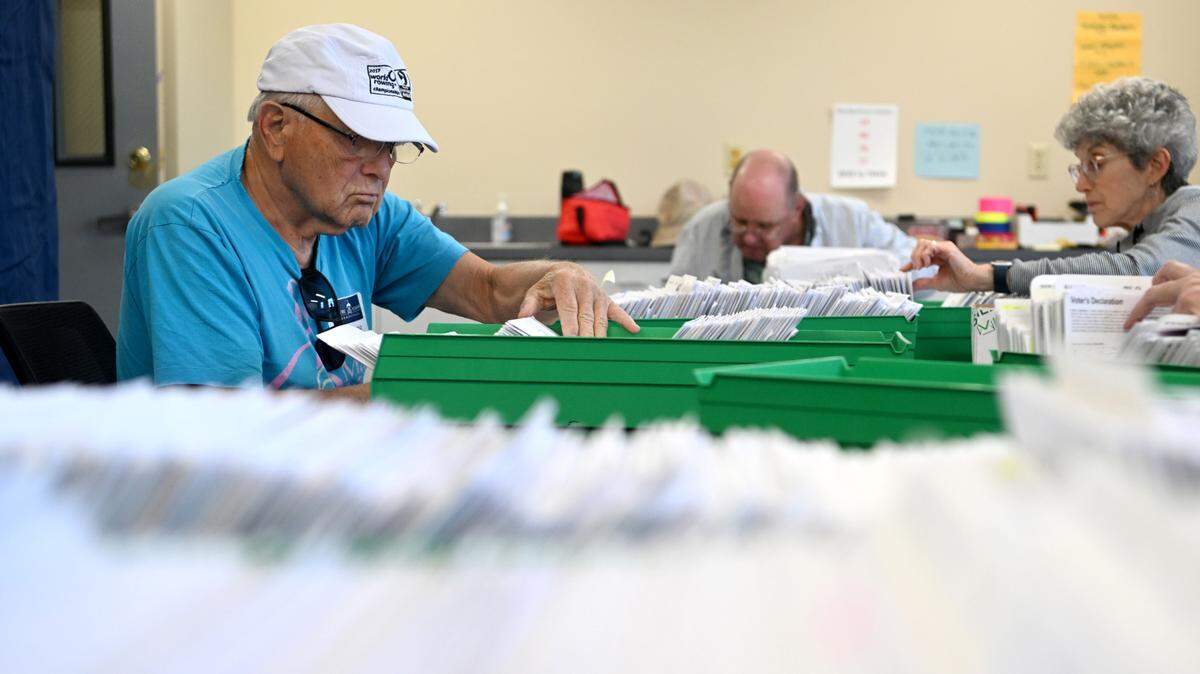Wayne Knepper and fellow election office volunteers sort mail in ballots Monday at the Willowbank Building. Polls will be open 7 a.m. to 8 p.m. Tuesday for the primary election. Visit CentreDaily.com for results.