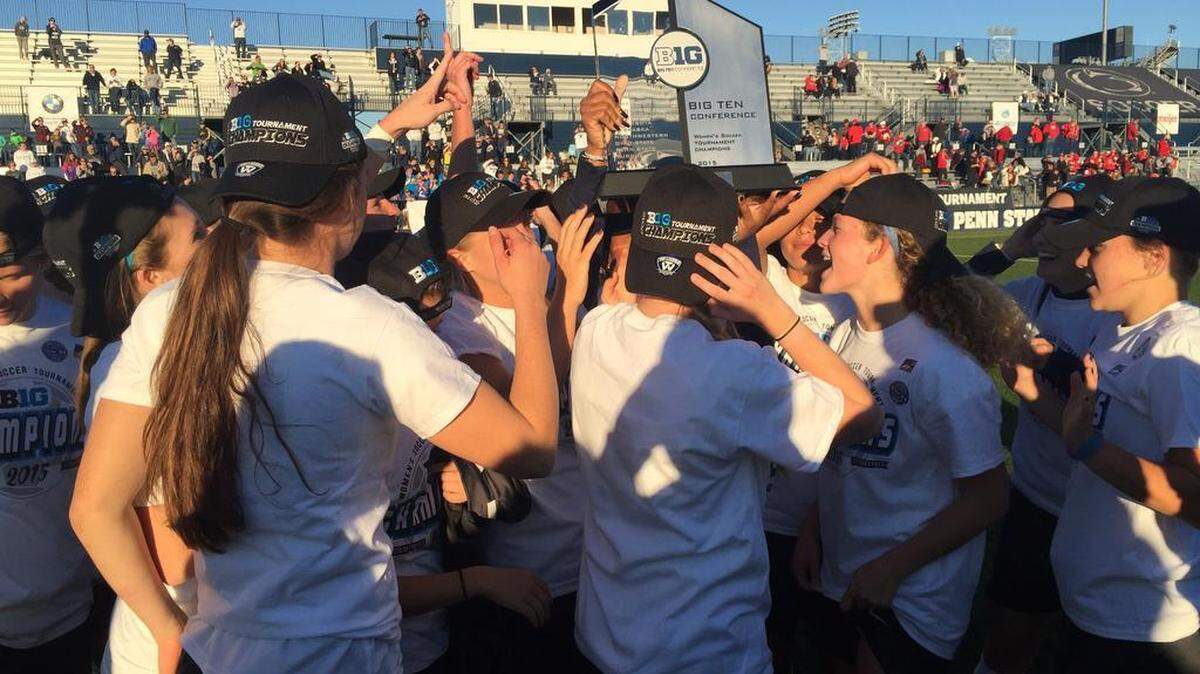 Penn State players celebrate with the Big Ten tournament trophy after beating Rutgers 2-0 in the championship game on Sunday at Jeffrey Field.
