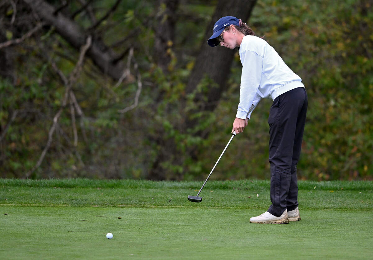 Saint Joseph’s Catholic Academy’s Madison Koshko putts on the 15th hole during the PIAA State Golf Championships on Tuesday, Oct. 21 2025, at the Penn State Golf Course.