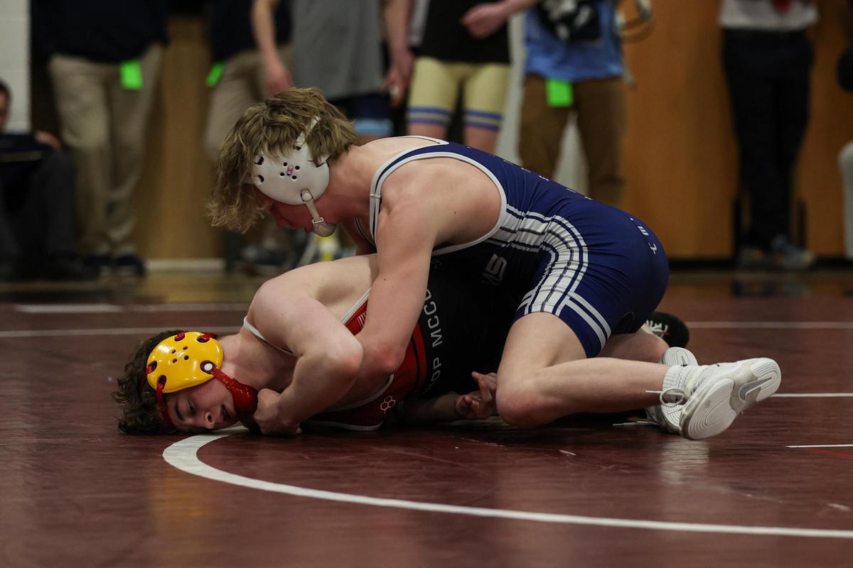 Penns Valley’s Max Dinges controls Bishop McCort’s Eli Herring in their 114-pound finals match of the PIAA Class 2A Southwest Regional on Saturday in Altoona. Dinges defeated Herring, 8-3.