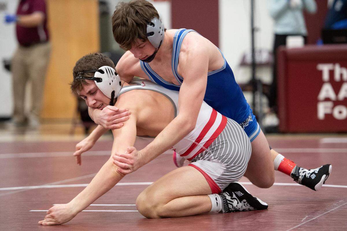 Bellefonte’s Aidan O’Shea wrestles Central Mountain’s Luke Simcox during the PIAA District 6 AAA Championships at Altoona Area High School on Saturday, Feb. 26, 2022 in Altoona, Pa.