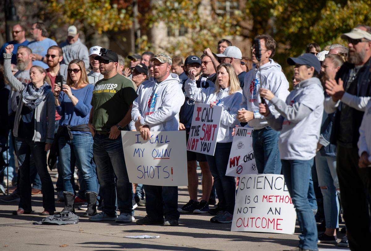 “I call my own shots” was one of many posters in the crowd at the Turning Point USA anti-mandate freedom rally outside of Old Main on Friday, Nov. 12, 2021.