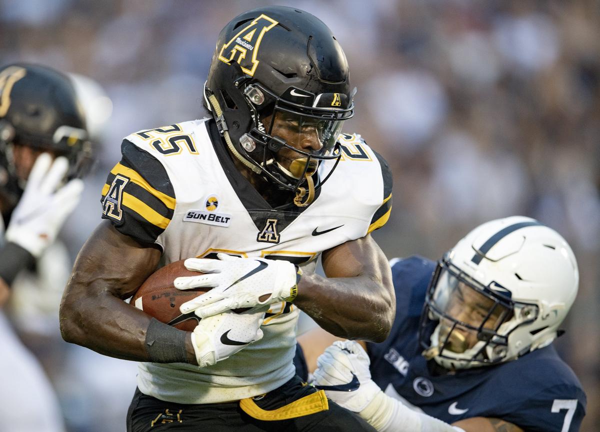 Penn State linebacker Koa Farmer can’t stop Appalachian State running back Jalin Moore as he runs for a touchdown during the Saturday, Sept. 1, 2018 game at Beaver Stadium.