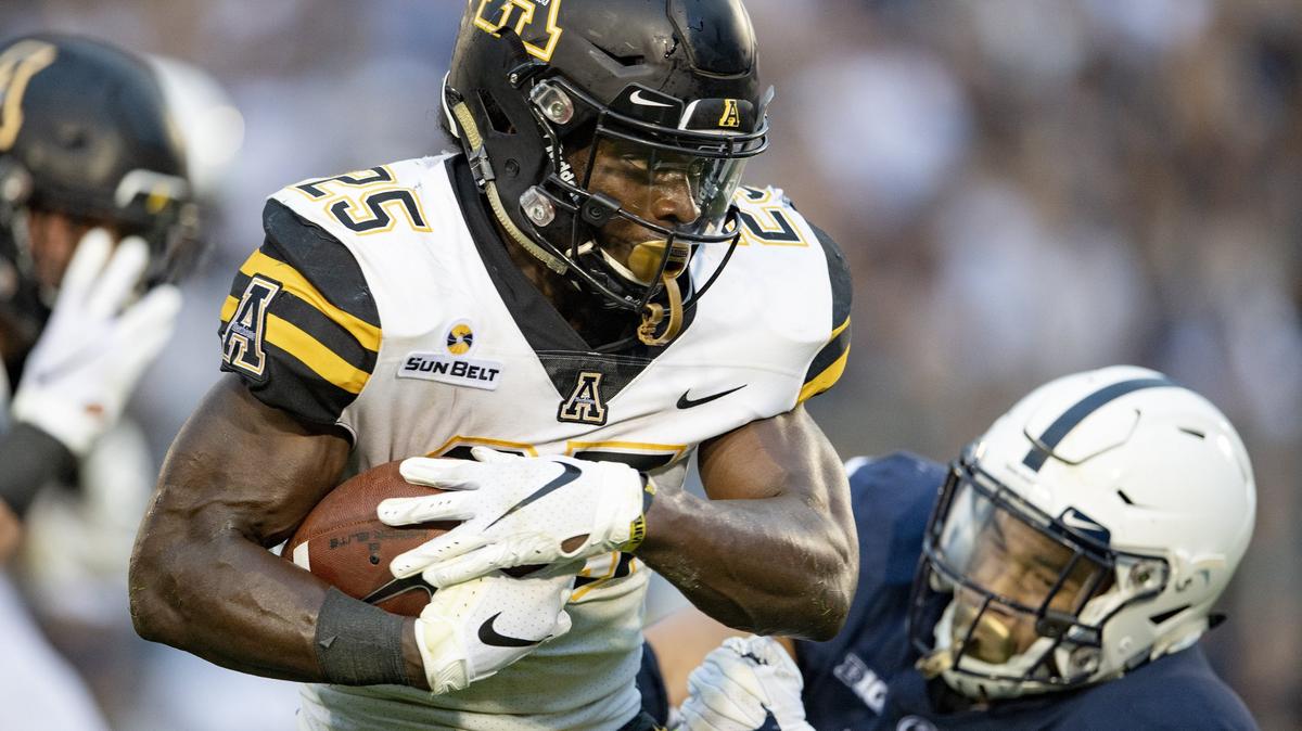 Penn State linebacker Koa Farmer can’t stop Appalachian State running back Jalin Moore as he runs for a touchdown during the Saturday, Sept. 1, 2018 game at Beaver Stadium.