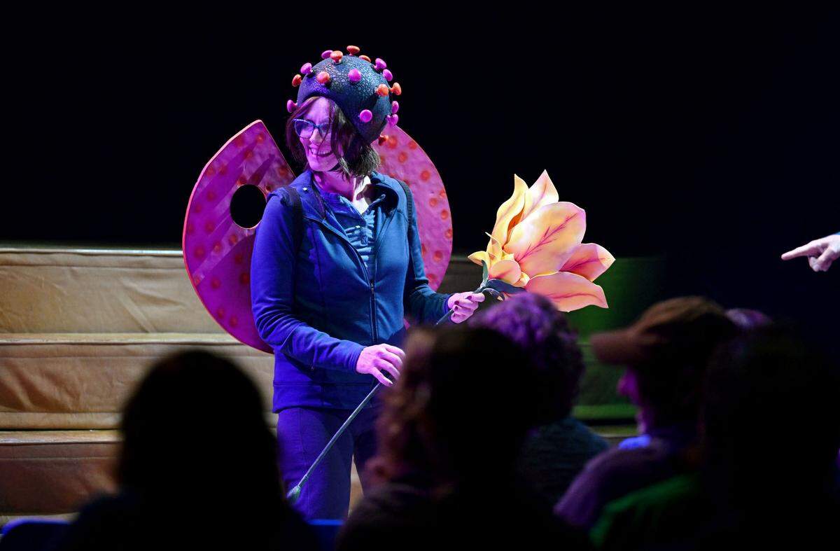 Megan Mahaffy was pulled from the audience to take part in a skit during the Cirque du Soleil show "Ovo" at the Bryce Jordan Center on Thursday, March 27, 2025.
