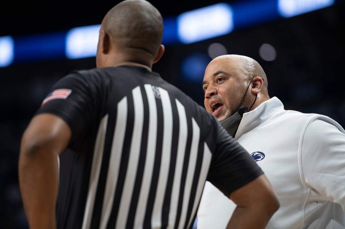 Penn State head coach Micah Shrewsberry speaks to an official during an NCAA Basketball game between Penn State and Michigan at the Bryce Jordan Center on Tuesday, Feb. 8, 2022 in University Park, Pa.