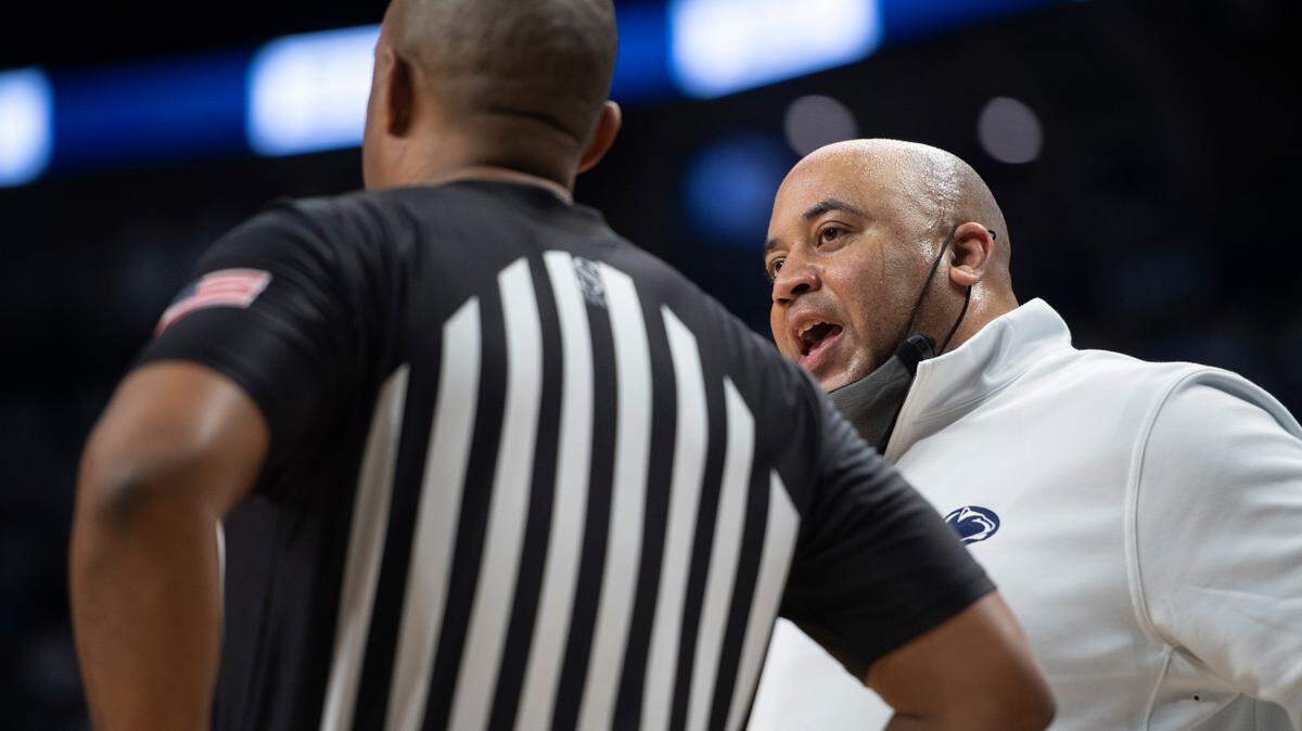 Penn State head coach Micah Shrewsberry speaks to an official during an NCAA Basketball game between Penn State and Michigan at the Bryce Jordan Center on Feb. 8.