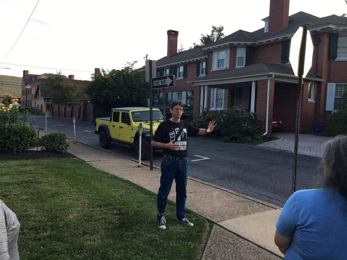 Paranormal researcher Lou Bernard of Clinton County leads a tour.