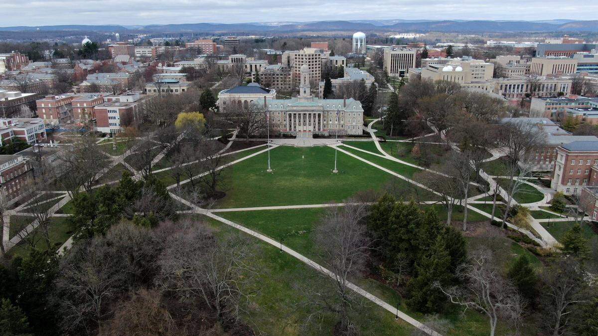 The walkways by Old Main on the Penn State campus were bare on Tuesday, March 24, 2020. Penn State suspended in-person classes due to the coronavirus.