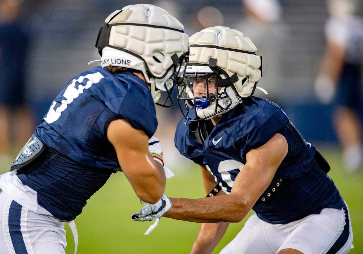 Penn State defensive end Davon Townley Jr. runs a drill against a teammate during practice on Wednesday, Aug. 25, 2021 in Beaver Stadium.