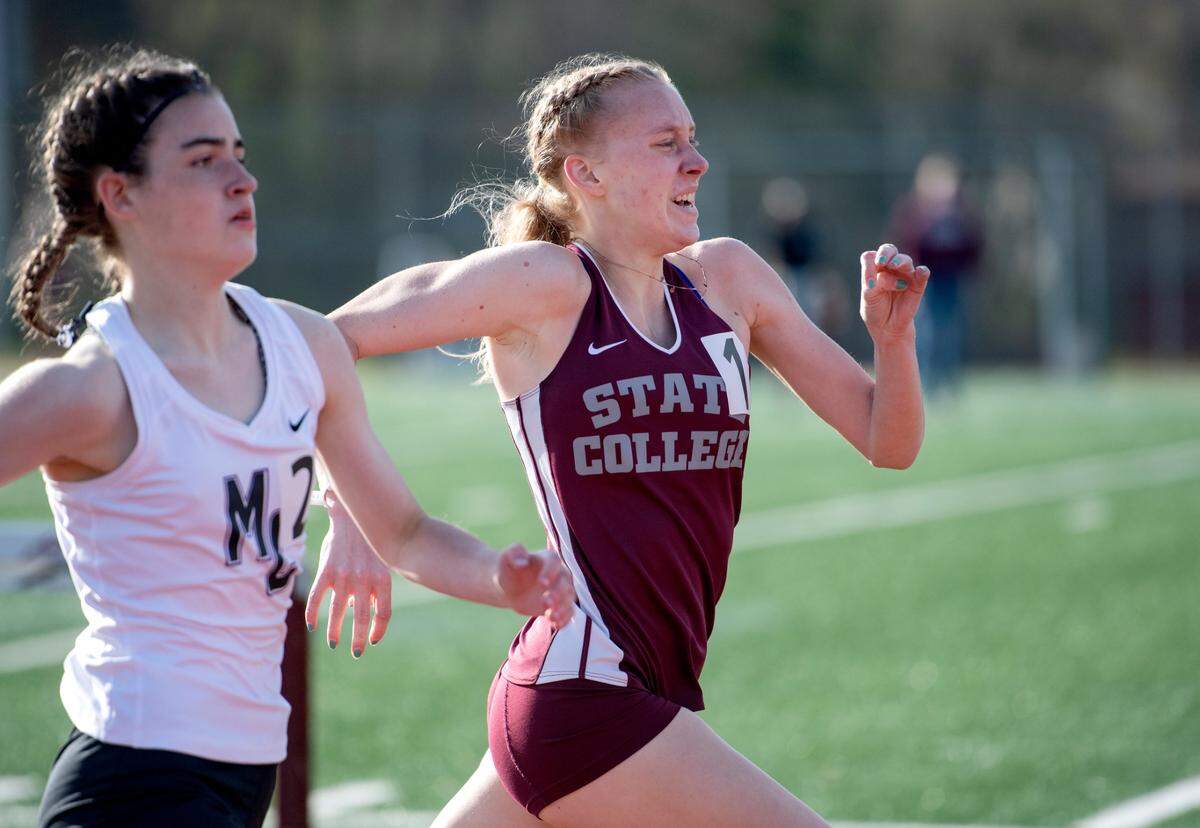 State College’s Karsyn Kane sprints to the finish of the 800 meter run during the track meet against Mifflin County on Tuesday, April 13, 2021.