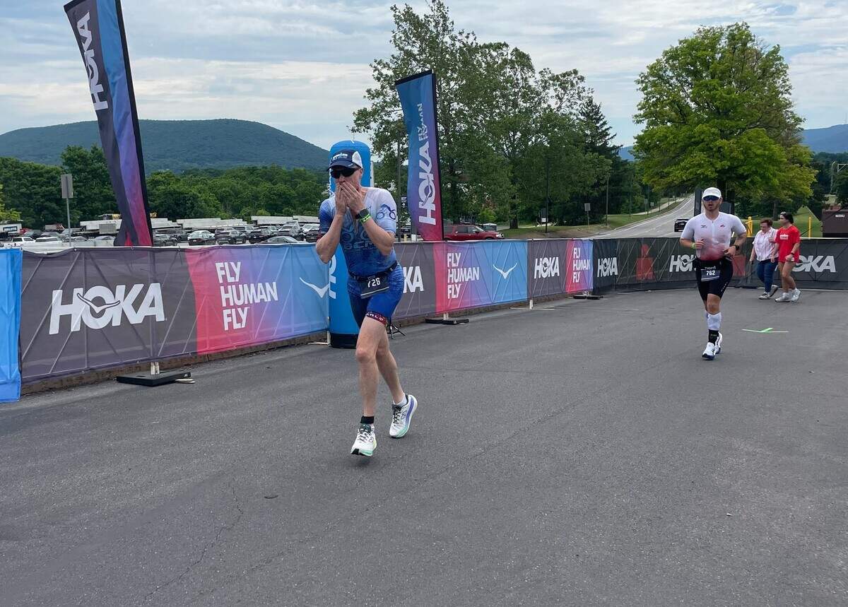 Thomas Haslam, from Australia, and Andrew Scheidemantel near the finish line Sunday, June 14, 2026, at the Ironman 70.3 Pennsylvania Happy Valley North American Championship in Centre and Clinton counties.