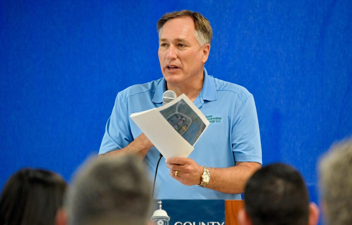 Douglas Berry, president and CEO of Solar Renewable Energy LLC, speaks Tuesday during the groundbreaking event for the solar panel installation at the Centre County Correctional Facility.