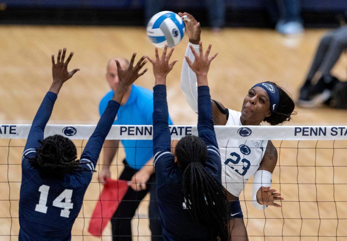 Penn State’s Kashauna Williams hits the ball over Howard defenders during the match on Friday, Sept. 16, 2022.
