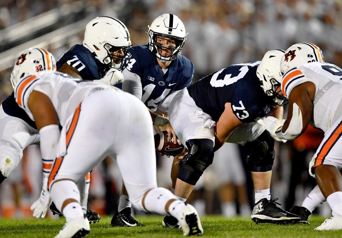 Penn State quarterback Sean Clifford takes the snap during the game.
