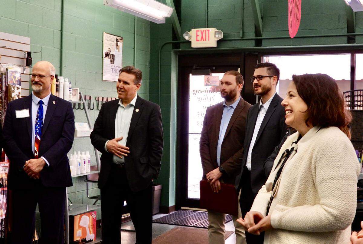 Centre County Commissioner Mark Higgins, Rep. Paul Takac, and DCED’s Executive Assistant Cody Failor, Executive Deputy Secretary Mike Hanna and Deputy Secretary of Marketing, Tourism and Film Carrie Fischer Lepore visited S’Hair-Eng Styling Salon on Thursday.