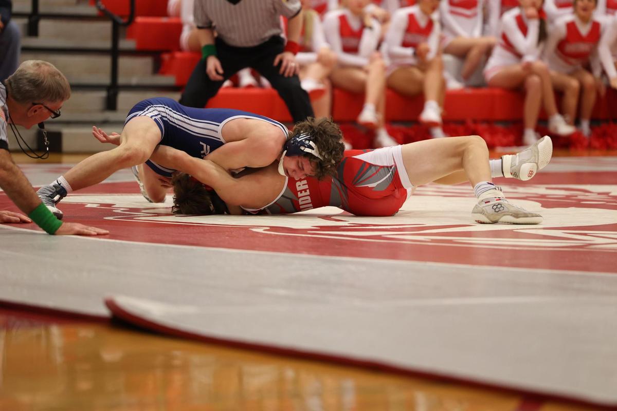 Penns Valley’s Zach Rummel looks for the fall of Bellefonte’s Jackson Long in their 127 pound bout of the Rams’ 51-15 win on Wednesday, January 4, 2023. Rummel did pin Long in 5:02.