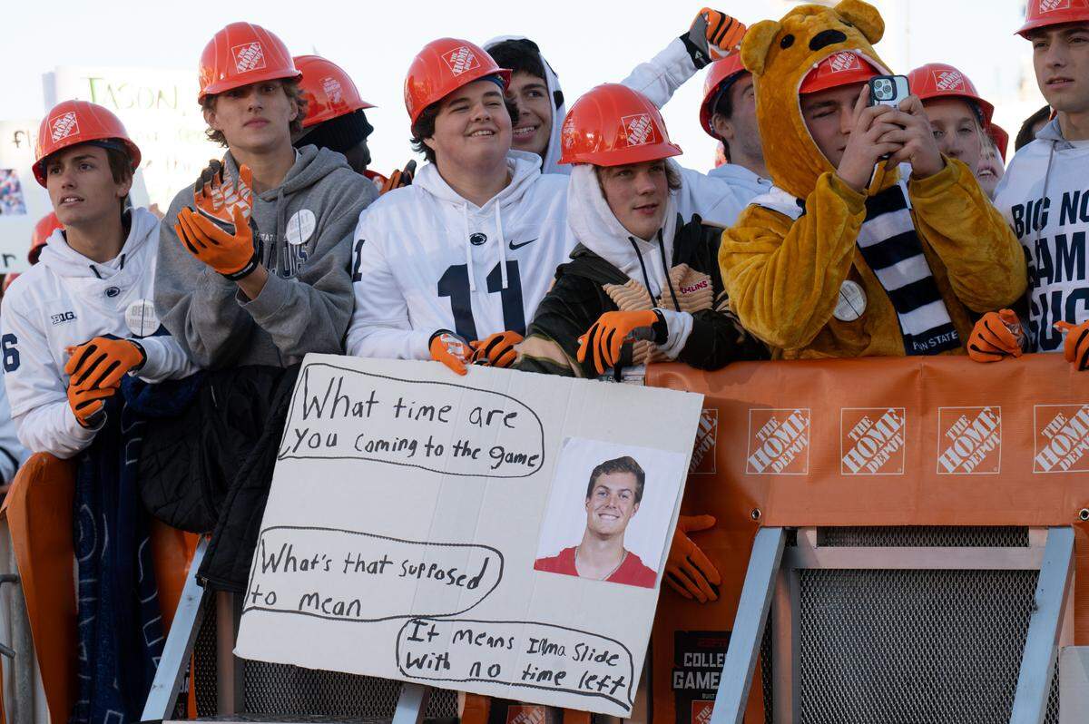 Penn State fans hold up signs on the set of ESPN College GameDay before the game against Ohio State at Beaver Stadium on Saturday, Nov. 2, 2024.