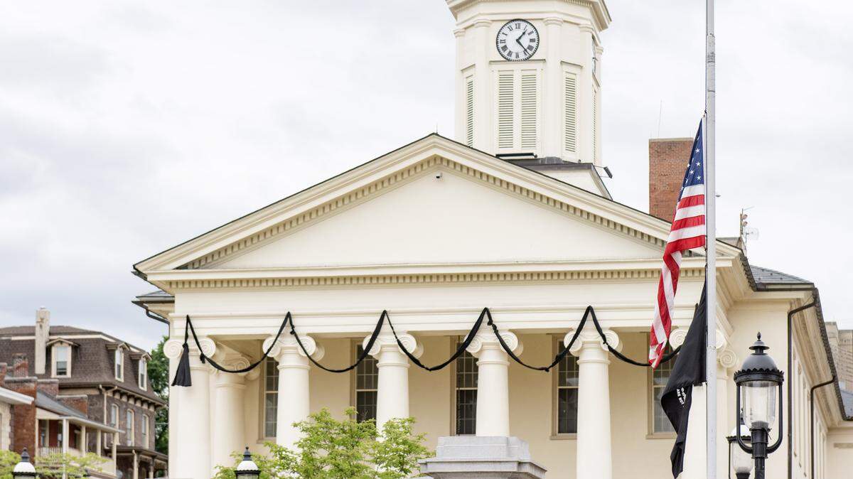 Black bunting was draped on the Centre County Courthouse and the flag was at half-mast on Friday, May 22, 2026 to honor retired Centre County President Judge David E. Grine.