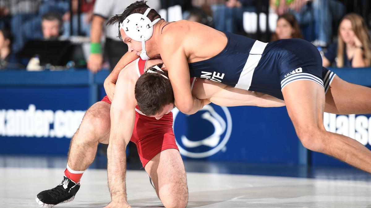 Penn State’s Shakur Rasheed, 184 lbs (top) drives Wisconsin’s Mason Reinhardt during Sunday’s dual at Rec. Hall. Rasheed has been sidelined with injury and only wrestled one bout since the dual with Wisconsin.