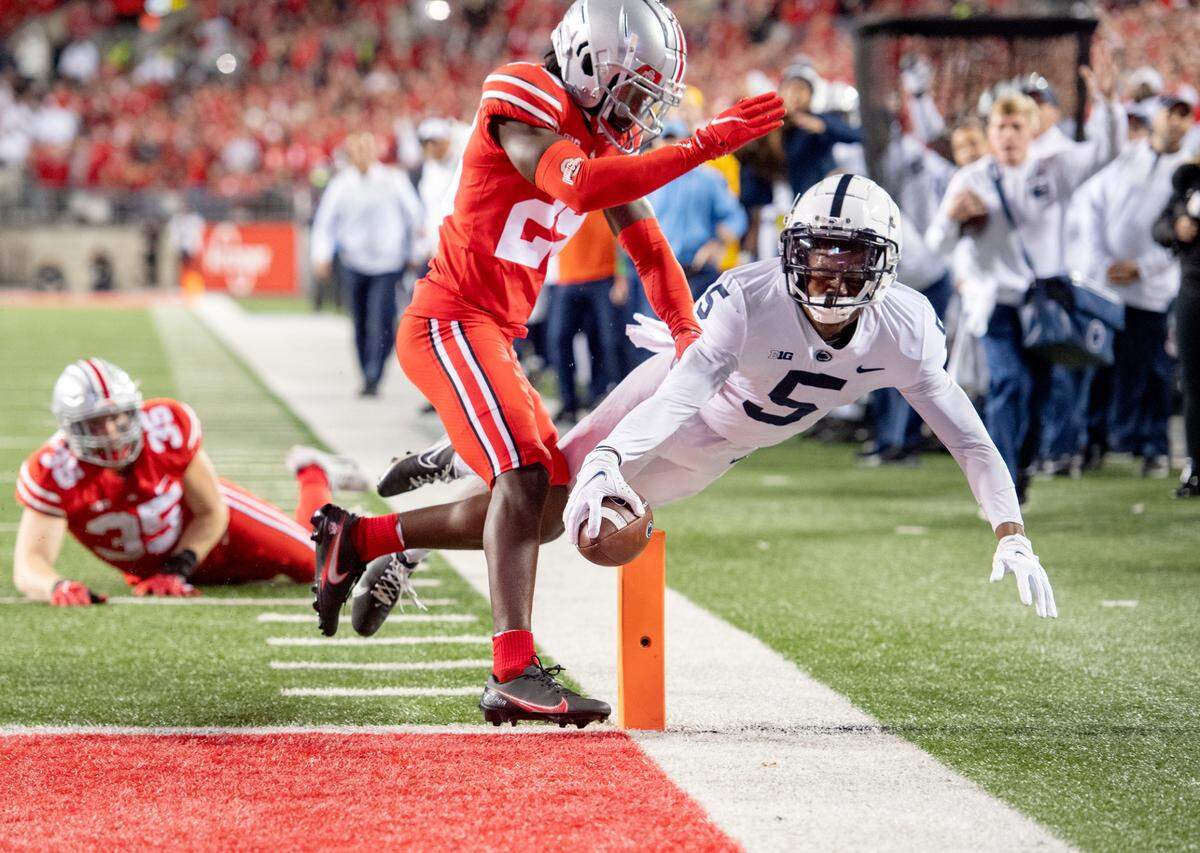 Ohio State defenders couldn’t stop Penn State wide receiver Jahan Dotson as he dove into the end zone for a touchdown in the third quarter of the game on Oct. 30 at Ohio Stadium.