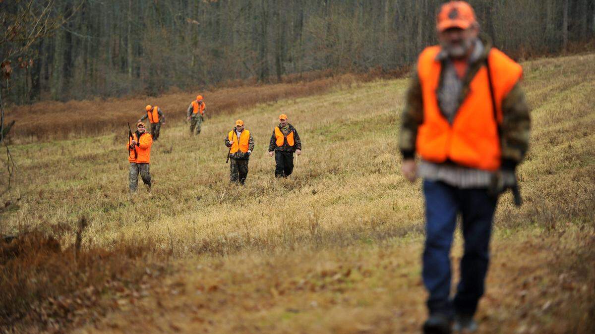 A Philipsburg hunting club walks together in 2014 in Moshannon State Forest. Proposed changes from the state Game Commission and Legislature mean firearms deer hunting season could start the Saturday after Thanksgiving, and potentially include Sundays.