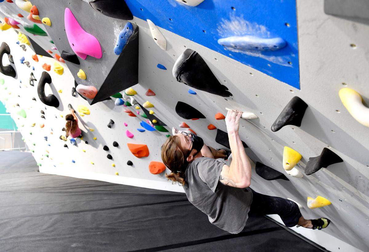 Drue Seksinsky climbs at Climb Nittany on Thursday, Nov. 12, 2020. The new gym in Boalsburg is open for climbing as construction continues.
