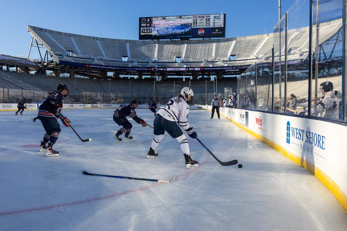 Penn State Forward Grace Outwater (8) gains possession of the puck during the Penn State women’s hockey game at Beaver Stadium on Friday, Jan. 30, 2026.