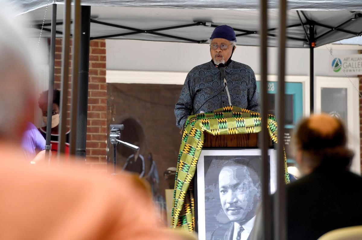 Charles Dumas speaks during the inaugural Juneteenth celebration hosted by the State College NAACP at MLK Plaza in State College on Friday, June 19, 2020.