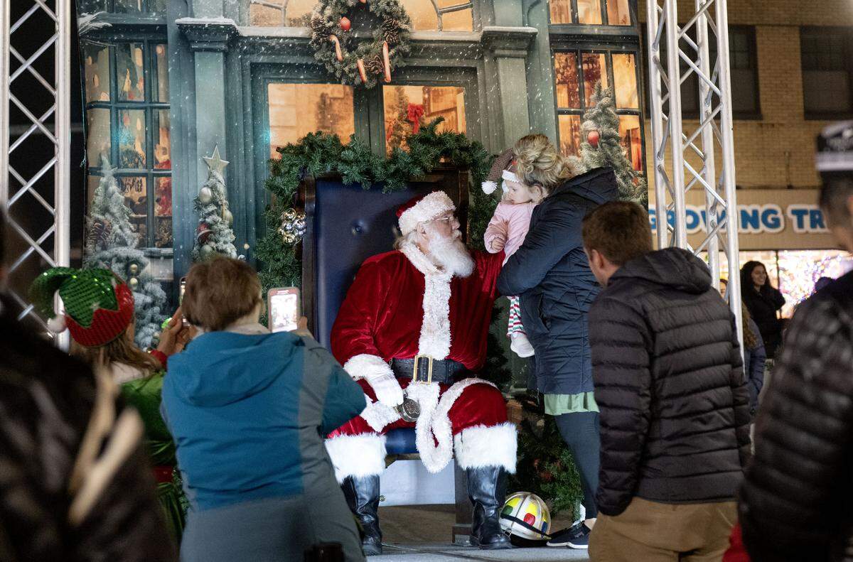 Youngsters visit with Santa during Light Up Night on Thursday, Nov. 20, 2025.  