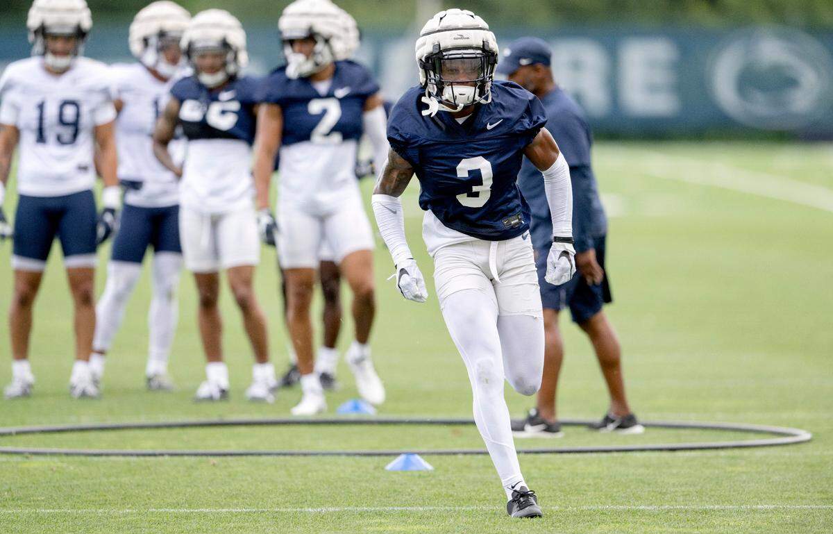 Penn State cornerback Johnny Dixon runs a drill during the first day of practice on Monday, Aug. 1, 2022.