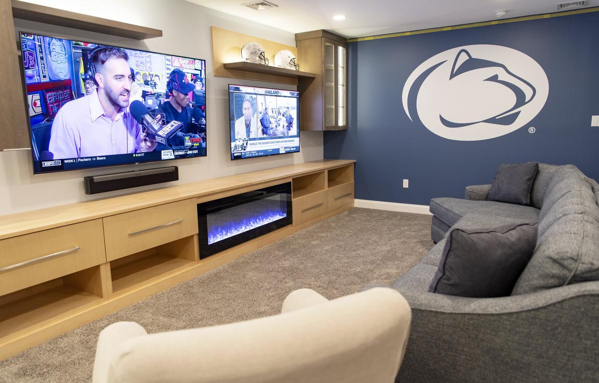 Parra Design is working on the finishing touches for the remodel of a basement into a game day viewing room.