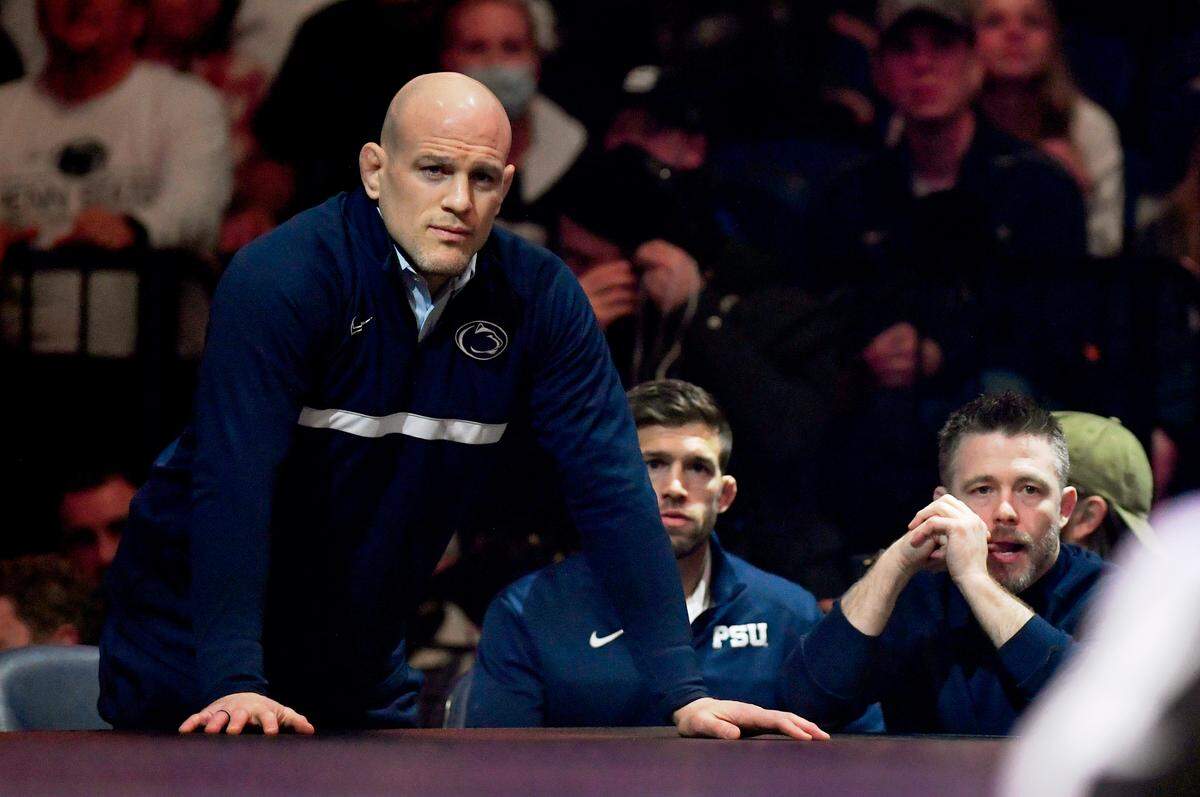 Penn State wrestling coach Cael Sanderson watches Marco Vespa’s match against Iowa’s Spencer Lee at the Bryce Jordan Center on Friday, Jan. 27, 2023.